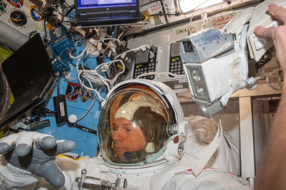 Astronaut Andreas Mogensen tries on his spacesuit