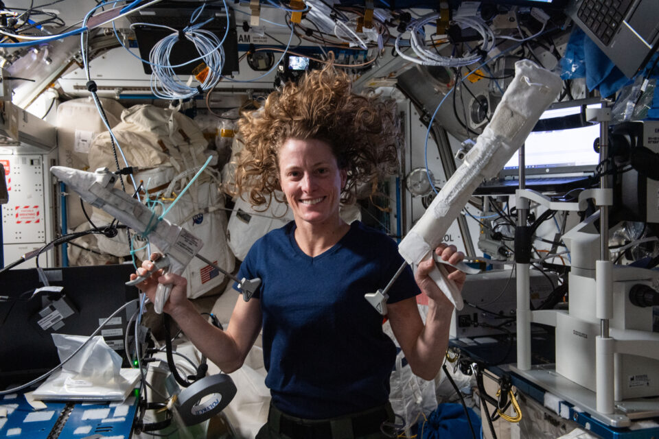 Astronaut Loral O’Hara shows off spacewalking tools