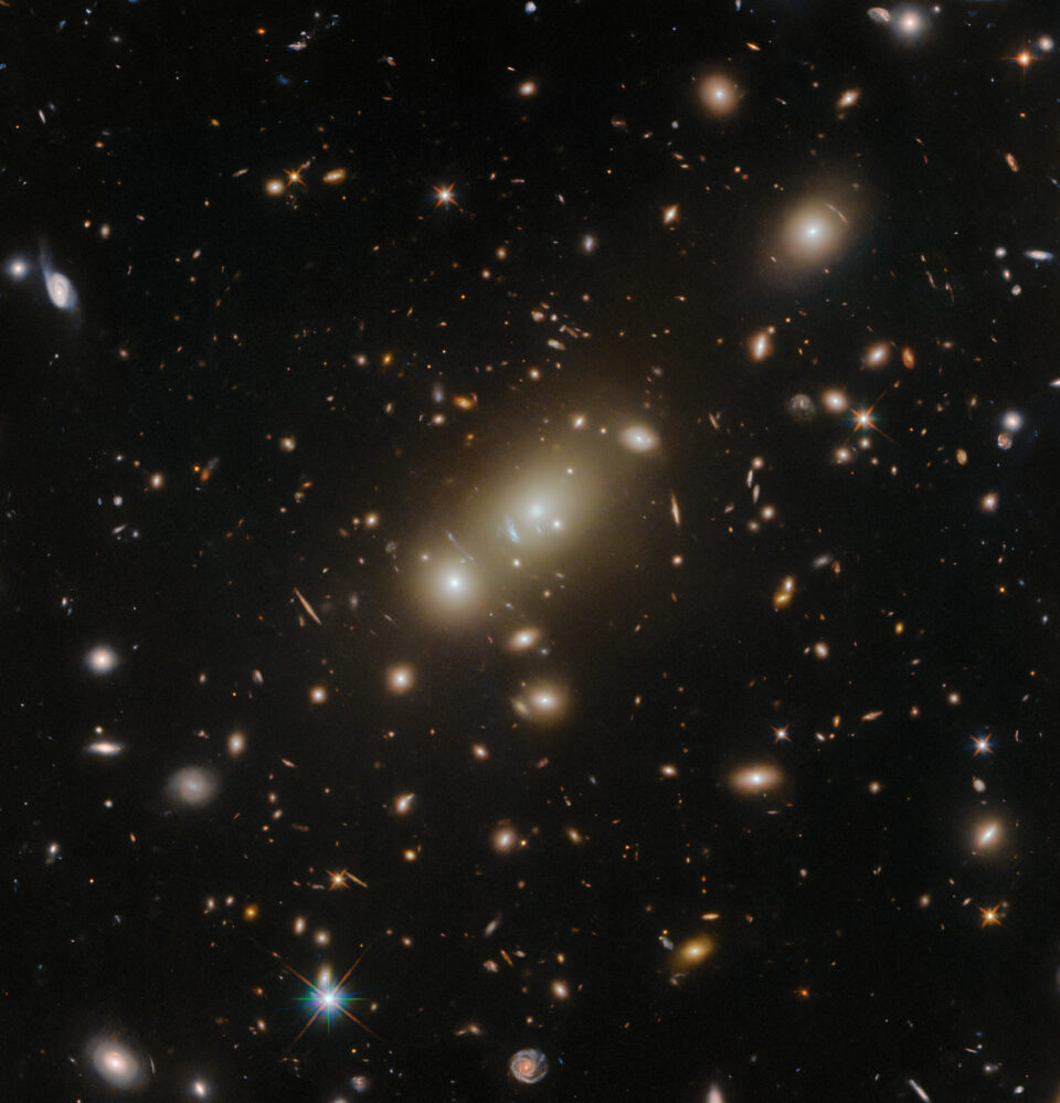 Hubble Views a Double Cluster of Glowing Galaxies