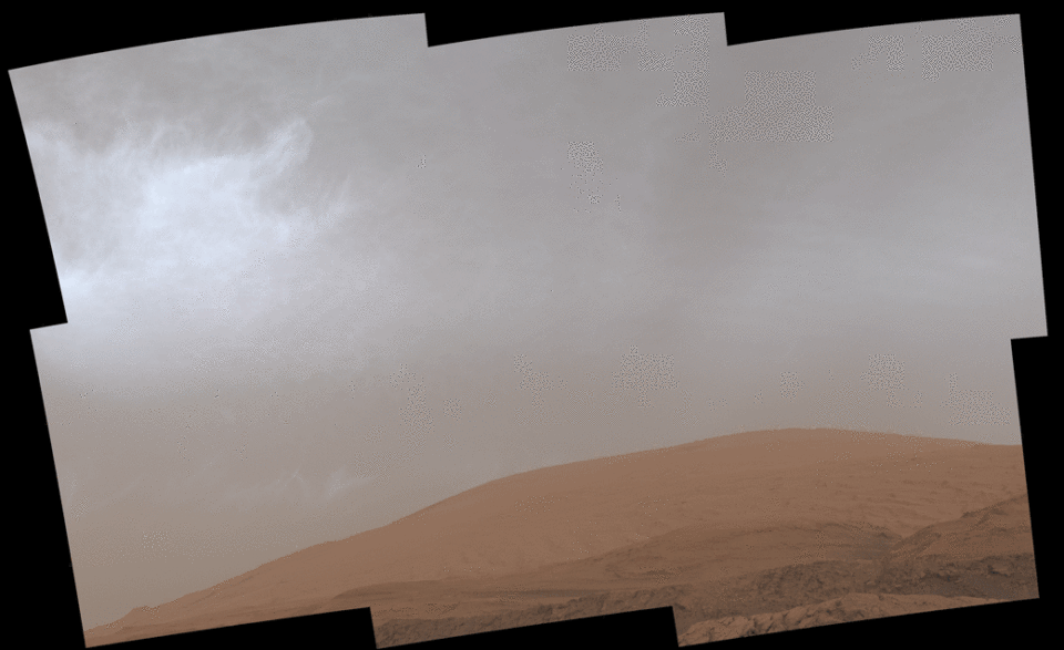 NASA’s Curiosity Rover Captures Colorful Clouds Drifting Over Mars