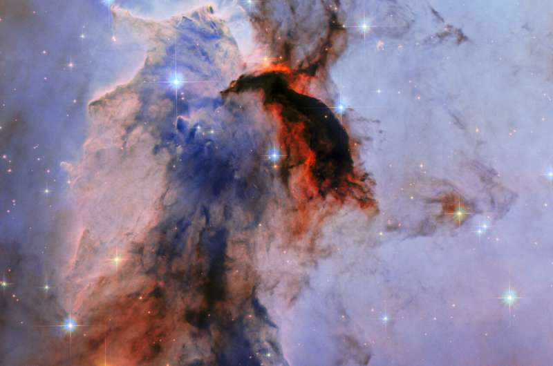 Hubble Spies Cosmic Pillar in Eagle Nebula