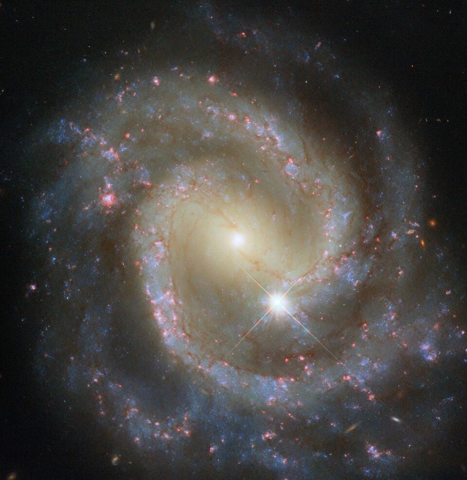 Hubble Spies Paired Pinwheel on Its Own
